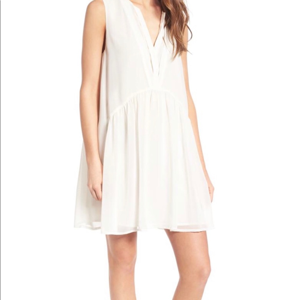 Cupcakes and Cashmere. Sheer Off White Dress